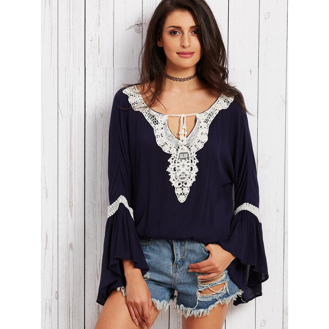 Blusa con ricami uninetto