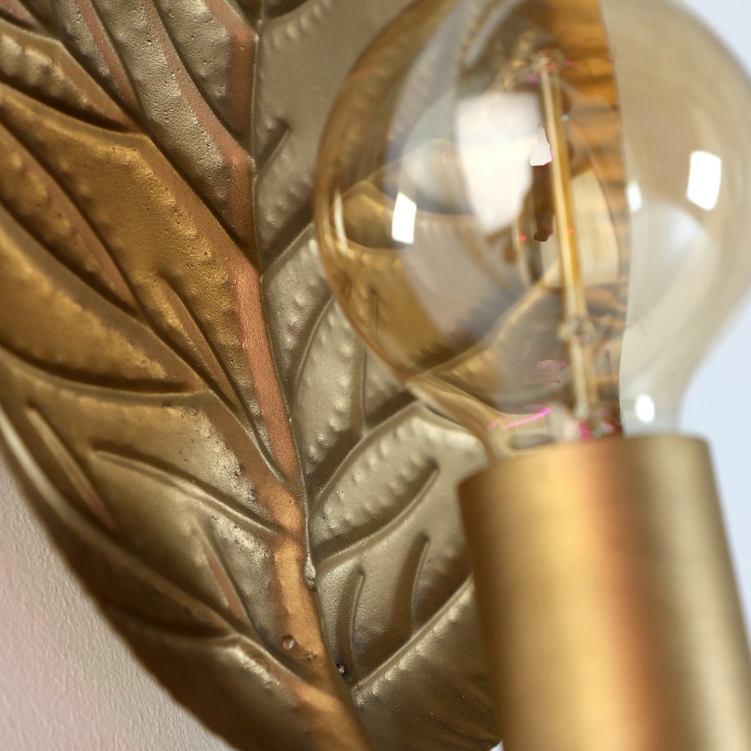 Applique art decò dorato