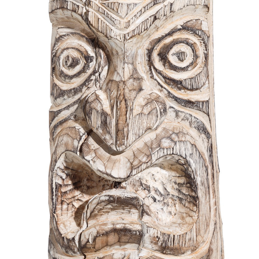 Statua totem in legno intagliata
