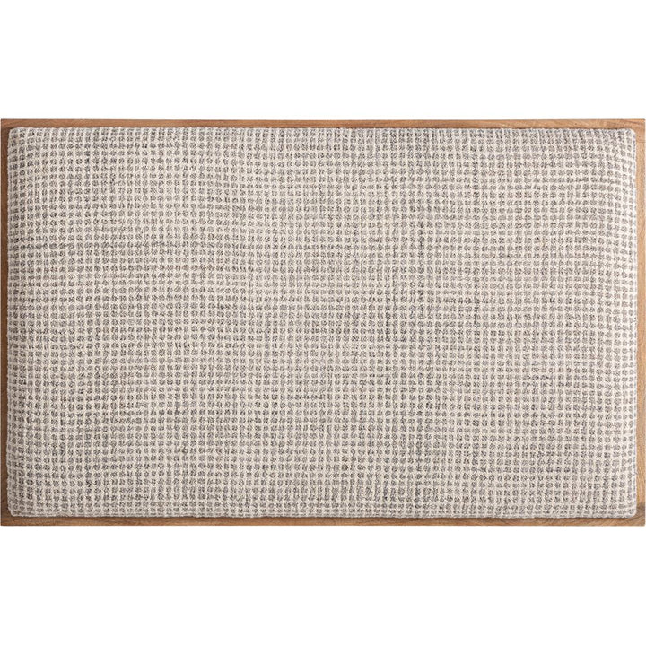 Testiera letto Beccles in lana beige e legno di mango.